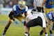 UCLA linebacker Anthony Barr, left, stands in front of Colorado tight end Scott Fernandez (99) on the line of scrimmage to play against Colorado in their NCCA college football game Saturday, Nov. 2, 2013, in Pasadena, Calif. (AP Photo/Alex Gallardo)