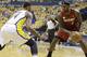 Miami Heat forward LeBron James (6) drives the ball against Indiana Pacers forward Paul George (24) during the first half of Game 6 of the NBA Eastern Conference basketball finals in Indianapolis, Saturday, June 1, 2013. (AP Photo/Michael Conroy)