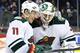 WINNIPEG, MB - APRIL 7: Zach Parise #11 and goaltender Ilya Bryzgalov #30 of the Minnesota Wild share a laugh following a 1-0 victory over the Winnipeg Jets at the MTS Centre on April 7, 2014 in Winnipeg, Manitoba, Canada. (Photo by Jonathan Kozub/NHLI via Getty Images)
