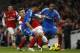 Arsenal's Jack Wilshere, left, competes with Hull City's Ahmed Elmohamady, right, and Liam Rosenior during their English Premier League soccer match at Emirates Stadium in London, Wednesday, Dec. 4, 2013. (AP Photo/Sang Tan)