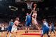 PORTLAND, OR - APRIL 16: Niolcas Batum #88 of the Portland Trail Blazers lays the ball in the basket during the game against Matt Barnes #22 of the Los Angeles Clippers on April 16, 2014 at the Moda Center Arena in Portland, Oregon. NOTE TO USER: User expressly acknowledges and agrees that, by downloading and or using this photograph, user is consenting to the terms and conditions of the Getty Images License Agreement. Mandatory Copyright Notice: Copyright 2014 NBAE (Photo by Sam Forencich/NBAE via Getty Images)