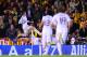 Real's Gareth Bale, left, celebrates after scoring his side's second goal during the final of the Copa del Rey between FC Barcelona and Real Madrid at the Mestalla stadium in Valencia, Spain, Wednesday, April 16, 2014. (AP Photo/Manu Fernandez)