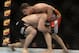 Apr 16, 2014; Quebec City, Quebec, Canada; Michael Bisping (red gloves) fights against Tim Kennedy (blue gloves) during their middleweight bout at Colisee Pepsi. Mandatory Credit: Eric Bolte-USA TODAY Sports