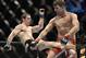 Apr 16, 2014; Quebec City, Quebec, Canada; Michael Bisping (red gloves) fights against Tim Kennedy (blue gloves) during their middleweight bout at Colisee Pepsi. Mandatory Credit: Eric Bolte-USA TODAY Sports
