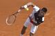 Novak Djokovic of Serbia serves the ball to Albert Montanes of Spain during their match of the Monte Carlo Tennis Masters tournament in Monaco, Tuesday, April 15, 2014. (AP Photo/Michel Euler)