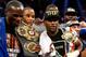 LAS VEGAS, NV - SEPTEMBER 14: Trainer/father Floyd Mayweather Sr. and Floyd Mayweather Jr. celebrate the majority decision victory against Canelo Alvarez in their WBC/WBA 154-pound title fight at the MGM Grand Garden Arena on September 14, 2013 in Las Vegas, Nevada. (Photo by Al Bello/Getty Images)