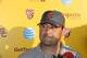 Southern California coach Steve Sarkisian takes questions from members of the media after spring practice for the NCAA college football team in Los Angeles, Thursday, March 13, 2014. (AP Photo/Damian Dovarganes)