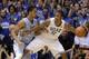 Duke's Rodney Hood (5) is pressured by North Carolina's J.P. Tokoto (13) during the first half of an NCAA college basketball game in Durham, N.C., Saturday, March 8, 2014. (AP Photo/Gerry Broome)