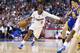 Los Angeles Clippers' Chris Paul drives around Golden State Warriors' Klay Thompson during the second half of an NBA basketball game in Los Angeles, Wednesday, March 12, 2014. The Clippers won 111-98. (AP Photo/Danny Moloshok)