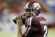 Texas A&M quarterback Johnny Manziel (2) warms up before the start of the Chick-fil-A Bowl NCAA college football game against Duke Tuesday, Dec. 31, 2013, in Atlanta. (AP Photo/John Bazemore)