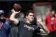 Former Georgia quarterback Aaron Murray works out for NFL football scouts during the school's pro day Wednesday, April 16, 2014 in Athens, Ga. (AP Photo/John Bazemore)