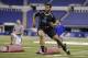 Pittsburgh defensive lineman Aaron Donald runs a drill at the NFL football scouting combine in Indianapolis, Monday, Feb. 24, 2014. (AP Photo/Michael Conroy)