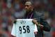 MANCHESTER, ENGLAND - AUGUST 25: Jamaican Athlete Usain Bolt poses with a United shirt prior to the Barclays Premier League match between Manchester United and Fulham at Old Trafford on August 25, 2012 in Manchester, England. (Photo by Shaun Botterill/Getty Images)
