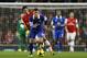 Arsenal's Mikel Arteta, looks from behind at Everton's Ross Barkley, front, as he is outpaced by Barkley during the English Premier League soccer match between Arsenal and Everton at the Emirates Stadium in London, Sunday, Dec. 8, 2013. (AP Photo/Kirsty Wigglesworth)