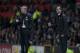 Everton's manager Roberto Martinez, right, issues instructions as he stands alongside Manchester United manager David Moyes during their English Premier League soccer match at Old Trafford Stadium, Manchester, England, Wednesday Dec. 4, 2013. (AP Photo/Jon Super)