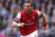 LIVERPOOL, ENGLAND - APRIL 06: Lukas Podolski of Arsenal in action during the Barclays Premier League match between Everton and Arsenal at Goodison Park on April 6, 2014 in Liverpool, England. (Photo by Alex Livesey/Getty Images)