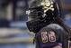 Dec 23, 2013; St. Petersburg, FL, USA; East Carolina Pirates linebacker Derrell Johnson (56) works out prior to the game against the Ohio Bobcats during the 2013 Beef O Bradys Bowl at Tropicana Field. Mandatory Credit: Kim Klement-USA TODAY Sports