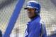 Los Angeles Dodgers' Yasiel Puig warms up at the batting cage prior to a baseball game against the San Francisco Giants on Saturday, April 5, 2014, in Los Angeles. (AP Photo/Alex Gallardo)