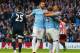 MANCHESTER, ENGLAND - APRIL 16: Fernandinho of Manchester City celebrates after scoring the first goal with Sergio Aguero and Alvaro Negredo of Manchester City during the Barclays Premier League match between Manchester City and Sunderland at Etihad Stadium on April 16, 2014 in Manchester, England. (Photo by Alex Livesey/Getty Images)
