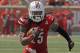 Louisville's Calvin Pryor turns and runs after picking off a pass against Eastern Kentucky in their NCAA college football game in Louisville, Ky., Saturday, Sept. 7, 2013. Louisville beat Eastern Kentucky 44-7. (AP Photo/Garry Jones)