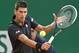 Novak Djokovic of Serbia, returns the ball to Guillermo Garcia-Lopez of Spain during their quarterfinals match of the Monte Carlo Tennis Masters tournament in Monaco, Friday, April 18, 2014. (AP Photo/Michel Euler)