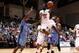 Nov 11, 2013; Garland, TX, USA; Southern Methodist Mustangs guard Jean-Micheal Mudiay (24) shoots against Rhode Island Rams guard Matthew Butler (11) during the second half at Curtis Culwell Center. Southern Methodist won 89-58. Mandatory Credit: Jim Cowsert-USA TODAY Sports
