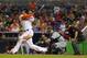 MIAMI, FL - APRIL 18: Giancarlo Stanton #27 of the Miami Marlins hits a walk off grand slam during a game against the Seattle Mariners at Marlins Park on April 18, 2014 in Miami, Florida. (Photo by Mike Ehrmann/Getty Images)