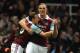 LONDON, ENGLAND - MARCH 26: Mark Noble of West Ham celebrates scoring the opening goal from the penalty spot with Andy Carroll of West Ham during the Barclays Premier League match between West Ham United and Hull City at Boleyn Ground on March 26, 2014 in London, England. (Photo by Steve Bardens/Getty Images)