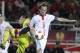 Sevilla's Ivan Rakitic, right, challenges for the ball with Maribor's Arghus Soares Bordignon during their Europa League round of 32, 2nd leg soccer match at the Ramon Sanchez Pizjuan stadium in Seville, Spain Thursday Feb. 27, 2014. (AP Photo/Toni Rodriguez)