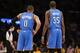 Oklahoma City Thunder point guard Russell Westbrook and Oklahoma City Thunder small forward Kevin Durant stand together on the court against the Los Angeles Lakers during the second half of an NBA basketball game in Los Angeles, Sunday, March 9, 2014. The Lakers won 114-110. (AP Photo/Danny Moloshok)