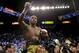Floyd Mayweather Jr. reacts after defeating Robert Guerrero by unanimous decision in a WBC welterweight title fight, Saturday, May 4, 2013, in Las Vegas. (AP Photo/Isaac Brekken)
