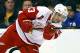 Detroit Red Wings' Pavel Datsyuk fires a shot against the Boston Bruins during the third period of Detroit's 1-0 win in a first-round NHL playoff hockey game in Boston Friday, April 18, 2014. (AP Photo/Winslow Townson)