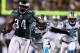 PHILADELPHIA, PA - NOVEMBER 26: Bryce Brown #34 of the Philadelphia Eagles carries the ball in for a touchdown as Sherrod Martin #23 of the Carolina Panthers defends on November 26, 2012 at Lincoln Financial Field in Philadelphia, Pennsylvania. (Photo by Elsa/Getty Images)