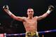 MANCHESTER, ENGLAND - APRIL 19: Scott Quigg celebrates after knocking out Tshifhiwa Munyai during the WBA World Super Bantamweight Title fight between Scott Quigg and Tshifhiwa Munyai at MEN Arena on April 19, 2014 in Manchester, England. (Photo by Alex Livesey/Getty Images)