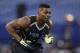 Buffalo linebacker Khalil Mack runs a drill at the NFL football scouting combine in Indianapolis, Monday, Feb. 24, 2014. (AP Photo/Michael Conroy)