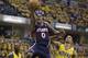 Atlanta Hawks' Jeff Teague shoots against Indiana Pacers' George Hill during the first half in Game 1 of an opening-round NBA basketball playoff series on Saturday, April 19, 2014, in Indianapolis. (AP Photo/Darron Cummings)