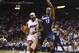 Miami Heat's Ray Allen (34) tries to steal the ball from Charlotte Bobcats' Anthony Tolliver (43) during the second half of an NBA basketball game in Miami, Monday, March 3, 2014. LeBron James scored a team record of 61 points. The Heat won 124-107. (AP Photo/J Pat Carter)