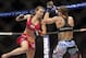 Miesha Tate, left, and Liz Carmouche fight in a mixed martial arts event on Saturday, April 19, 2014, at UFC Fight Night in Orlando Fla. Tate defeated Carmouche. (AP Photo/Reinhold Matay)