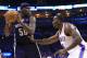 Memphis Grizzlies forward Zach Randolph (50) faces the basket as Oklahoma City Thunder center Kendrick Perkins (5) defends during the first quarter of Game 1 of the opening-round NBA basketball playoff series in Oklahoma City on Saturday, April 19, 2014. (AP Photo/Alonzo Adams)
