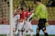 Monaco's team celebrate in font of Sochaux goalkeeper Yohann Pele, right, after Monaco's Dimitar Berbatov, left, scored the first goal against Sochaux during their French League One soccer match, in Monaco stadium, Saturday, March 8 , 2014. (AP Photo/Lionel Cironneau)