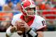 JACKSONVILLE, FL - NOVEMBER 02: Aaron Murray #11 of the Georgia Bulldogs attempts a pass during the game against the Florida Gators at EverBank Field on November 2, 2013 in Jacksonville, Florida. (Photo by Sam Greenwood/Getty Images)