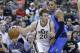 Utah Jazz's Gordon Hayward (20) drives around Dallas Mavericks' Shawn Marion, right, in the second half during an NBA basketball game Tuesday, April 8, 2014, in Salt Lake City. (AP Photo/Rick Bowmer)