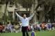Matt Kuchar celebrates a birdie out of the bunker on the 18th green to win the final round of the RBC Heritage golf tournament in Hilton Head Island, S.C., Sunday, April 20, 2014. Kuchar won the tournament with 11-under par. (AP Photo/Stephen B. Morton)
