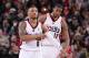 PORTLAND, OR - MARCH 5: Damian Lillard #0 and LaMarcus Aldridge #12 of the Portland Trail Blazers stand on the court against the Atlanta Hawks on March 5, 2014 at the Moda Center Arena in Portland, Oregon. NOTE TO USER: User expressly acknowledges and agrees that, by downloading and or using this photograph, user is consenting to the terms and conditions of the Getty Images License Agreement. Mandatory Copyright Notice: Copyright 2014 NBAE (Photo by Sam Forencich/NBAE via Getty Images)