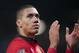Manchester United's Chris Smalling applauds supporters after his team's 2-0 win against Swansea City in their English Premier League soccer match at Old Trafford Stadium, Manchester, England, Saturday Jan. 11, 2014. (AP Photo/Jon Super)