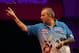 LONDON, ENGLAND - DECEMBER 13: Phil Taylor of England throws during his first round match against Rob Szabo of New Zealand during the Ladbrokes.com World Darts Championship on Day One at Alexandra Palace on December 13, 2013 in London, England. (Photo by Charlie Crowhurst/Getty Images)