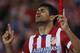 Atletico's Diego Costa celebrates his goal during a Spanish La Liga soccer match between Atletico de Madrid and Elche at the Vicente Calderon stadium in Madrid, Spain, Friday, April 18, 2014. (AP Photo/Gabriel Pecot)