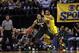 Michigan State forward Adreian Payne drives against Michigan forward Jon Horford in the first half of an NCAA college basketball game in the championship of the Big Ten Conference tournament Sunday, March 16, 2014, in Indianapolis. (AP Photo/Kiichiro Sato)