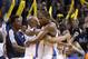 Oklahoma City Thunder forward Kevin Durant (35) embraces teammate Caron Butler, left, after the Thunder defeated the Detroit Pistons in an NBA basketball game in Oklahoma City, Wednesday, April 16, 2014. Oklahoma City won 112-111. (AP Photo/Sue Ogrocki)