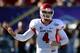 LAS VEGAS, NV - DECEMBER 21: Quarterback Derek Carr #4 of the Fresno State Bulldogs signals teammates during the team's game against the USC Trojans in the Royal Purple Las Vegas Bowl at Sam Boyd Stadium on December 21, 2013 in Las Vegas, Nevada. USC won 45-20. (Photo by Ethan Miller/Getty Images)